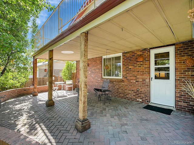 view of patio / terrace with a balcony