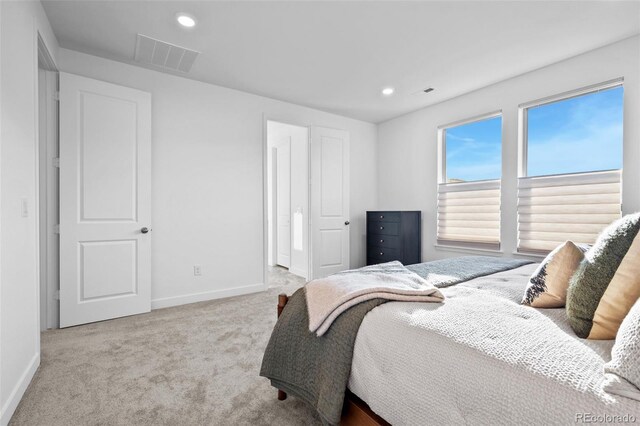 15606 W Girard Ave, Morrison, CO 80465 - carpeted bedroom with recessed lighting, baseboards, and visible vents