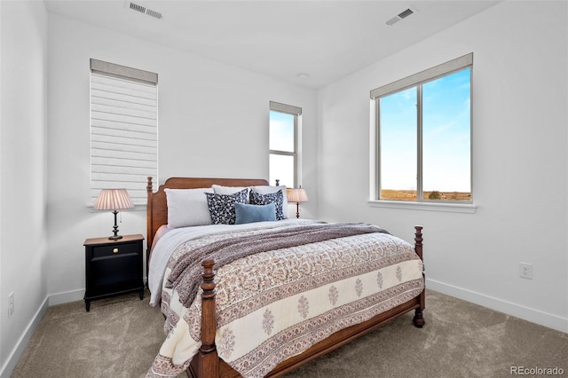 15606 W Girard Ave, Morrison, CO 80465 - carpeted bedroom with baseboards and visible vents