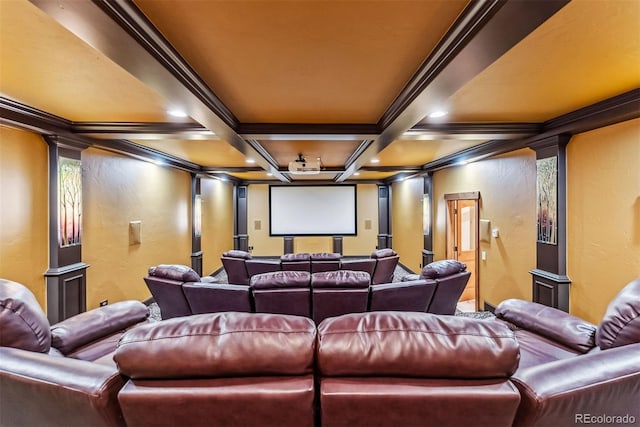 home theater room with decorative columns, coffered ceiling, beam ceiling, and crown molding