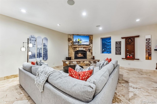 living room featuring a fireplace