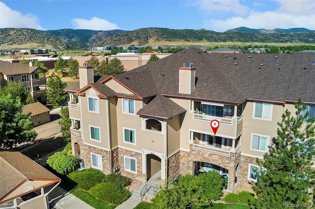 8427 S Hoyt Way Unit 203, Littleton, CO 80128 - aerial view of property and surrounding area with a mountainous background