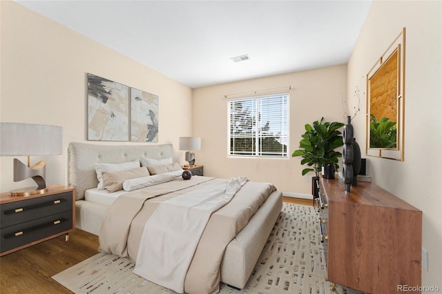 8427 S Hoyt Way Unit 203, Littleton, CO 80128 - bedroom with wood finished floors