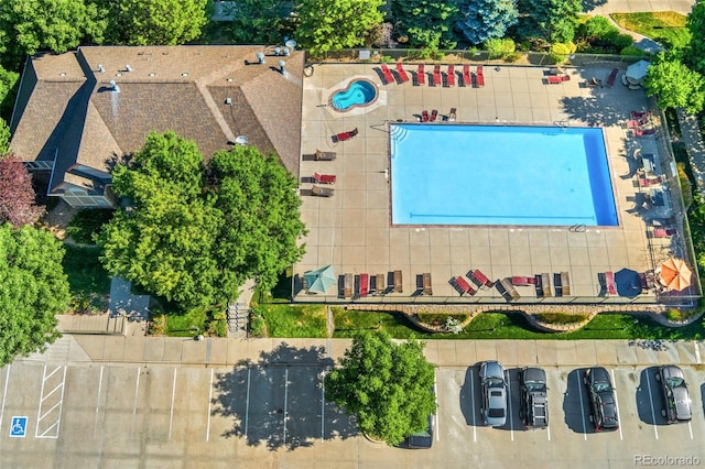 8427 S Hoyt Way Unit 203, Littleton, CO 80128 - aerial view of property and surrounding area featuring a pool