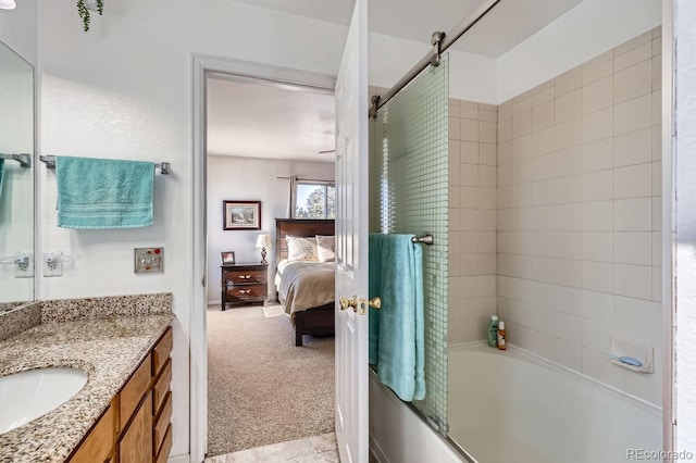 ensuite bathroom with  shower combination, ensuite bath, and vanity