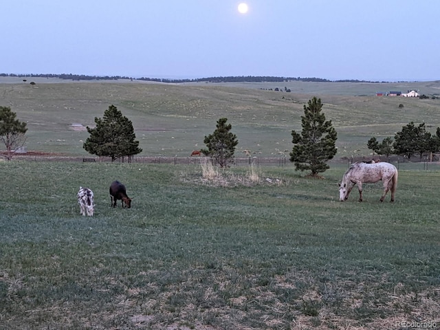 exterior space with a rural view
