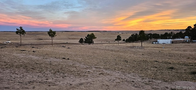 exterior space with a rural view