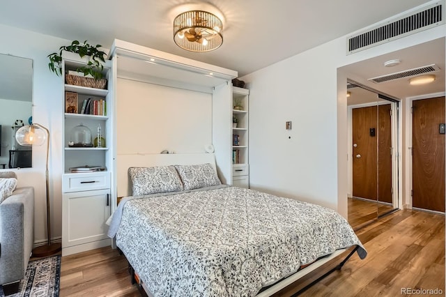790 N Washington St Unit 1003, Denver, CO 80203 - bedroom with light wood finished floors