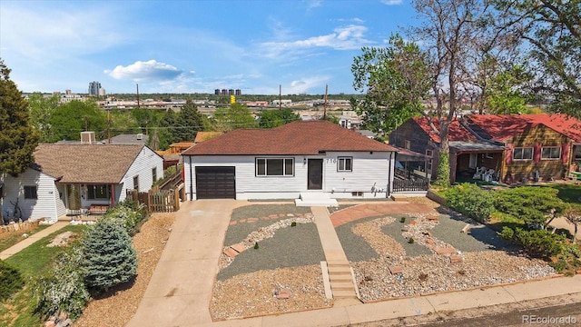 716 S Osage, Denver, CO 80223 - ranch-style home with driveway and an attached garage