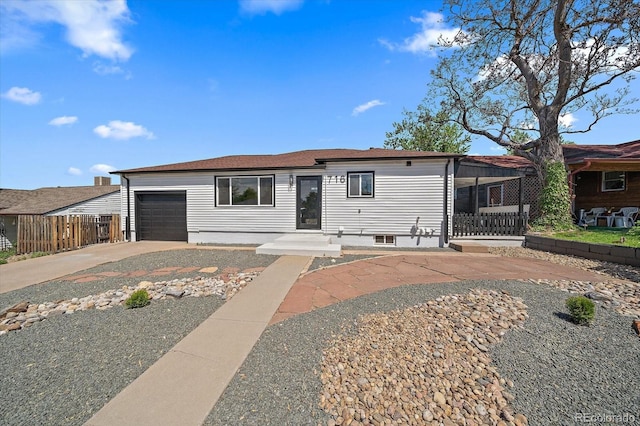 716 S Osage, Denver, CO 80223 - ranch-style home with driveway and an attached garage