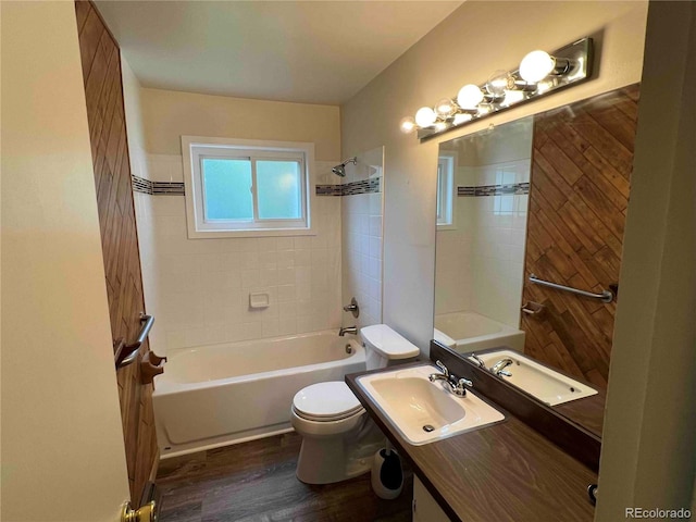 220 Lily Ln, Golden, CO 80403 - full bathroom featuring bathing tub / shower combination, vanity, and wood finished floors