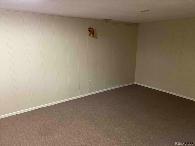 220 Lily Ln, Golden, CO 80403 - empty room featuring dark carpet