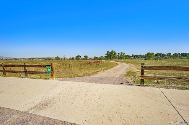 5404 W 95th Pl, Westminster, CO 80020 - view of concrete driveway with a view of rural / pastoral area