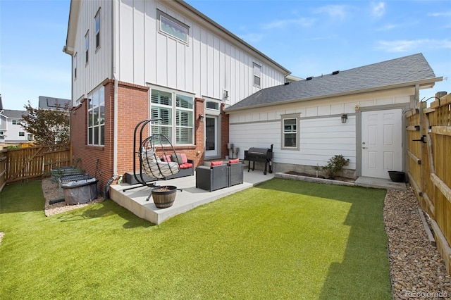 5404 W 95th Pl, Westminster, CO 80020 - rear view of property with board and batten siding, a fenced backyard, a patio area, brick siding, and outdoor lounge area