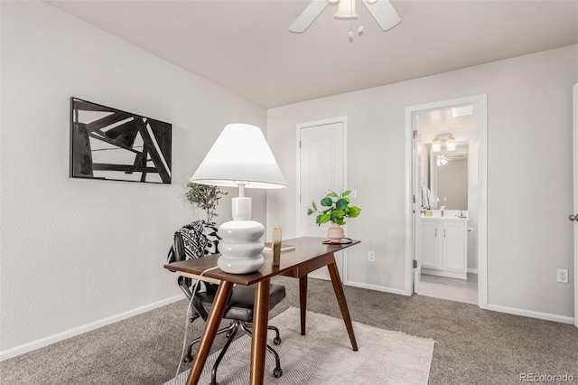 office space with carpet flooring and ceiling fan