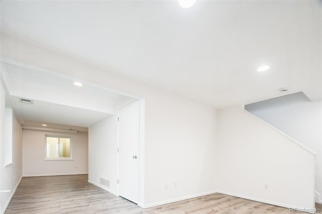bonus room with recessed lighting, baseboards, visible vents, and wood finished floors