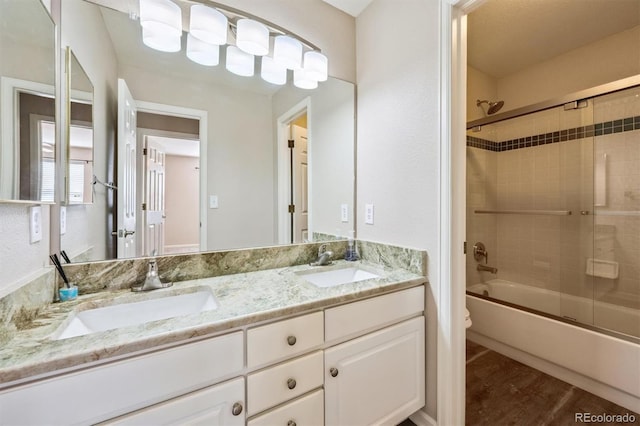 13540 Detroit St, Thornton, CO 80241 - bathroom featuring double vanity and enclosed tub / shower combo