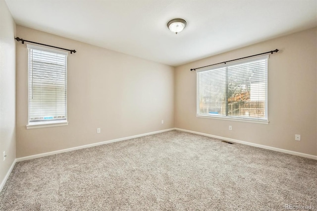 13540 Detroit St, Thornton, CO 80241 - spare room featuring carpet flooring and baseboards