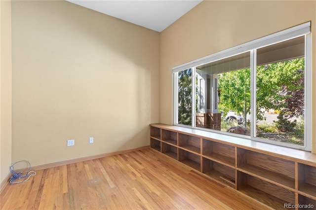 spare room featuring light hardwood / wood-style floors