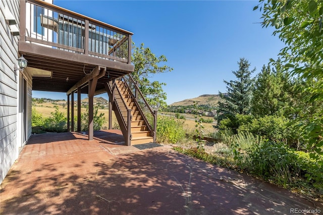 view of patio / terrace with a mountain view