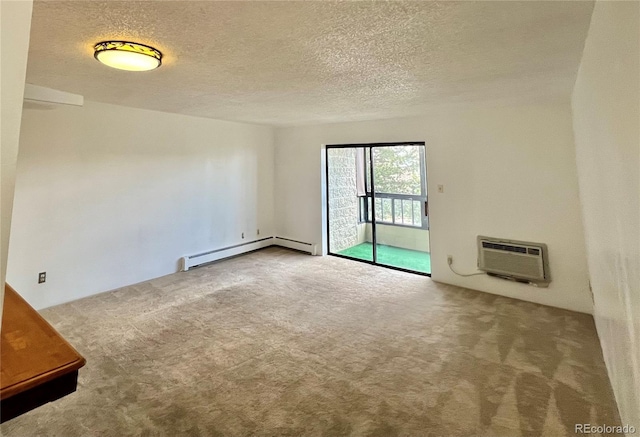 carpeted empty room with a wall unit AC, baseboard heating, and a textured ceiling