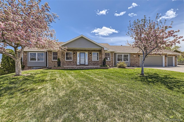 ranch-style house with a garage and a front lawn