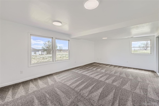 view of carpeted spare room