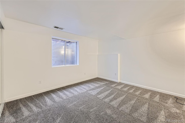 empty room featuring carpet flooring