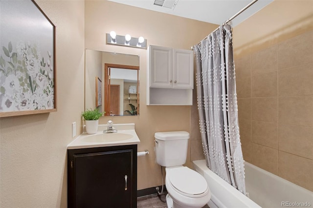 full bathroom featuring toilet, visible vents, vanity, baseboards, and shower / bath combination with curtain