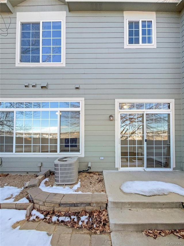 entrance to property featuring central AC