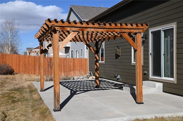 view of patio / terrace with a pergola and fence