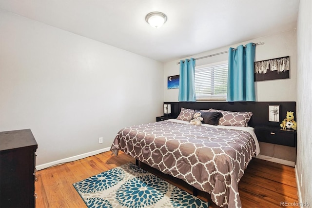 8460 Corona St, Denver, CO 80229 - bedroom with wood finished floors and baseboards