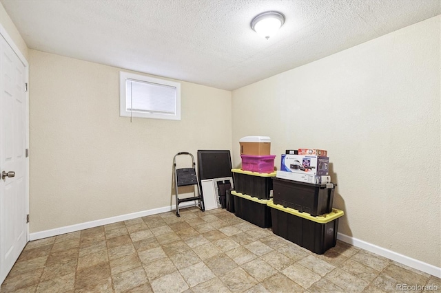 8460 Corona St, Denver, CO 80229 - home office featuring baseboards and a textured ceiling