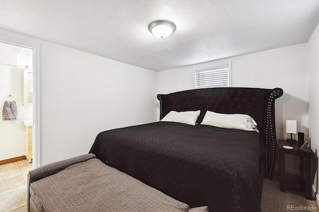 8460 Corona St, Denver, CO 80229 - bedroom featuring connected bathroom and carpet floors