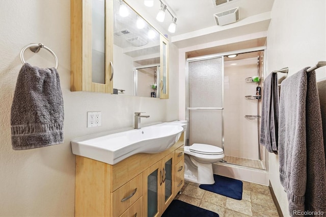 8460 Corona St, Denver, CO 80229 - bathroom featuring vanity and a shower stall