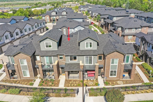 drone / aerial view with a residential view