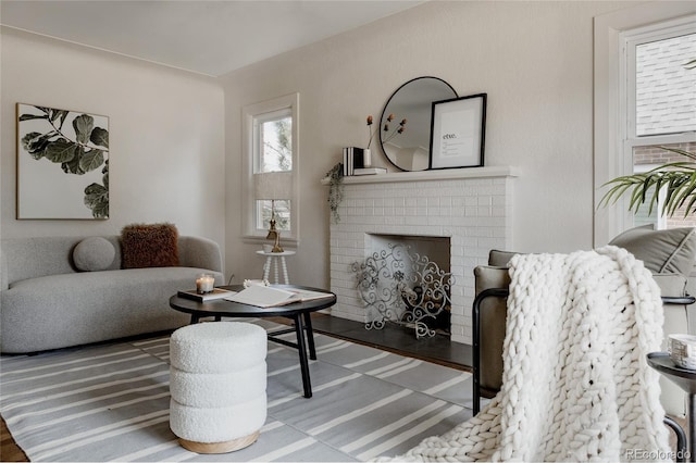 3055 Clermont St, Denver, CO 80207 - living room with a brick fireplace and wood finished floors