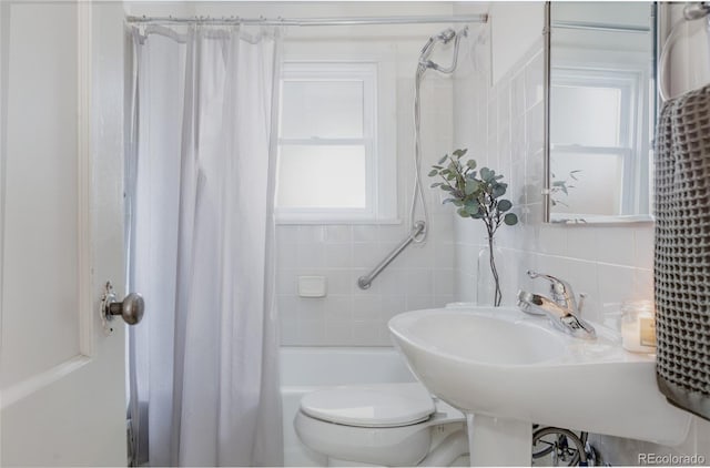 3055 Clermont St, Denver, CO 80207 - bathroom featuring toilet, shower / bath combination with curtain, tile walls, and decorative backsplash