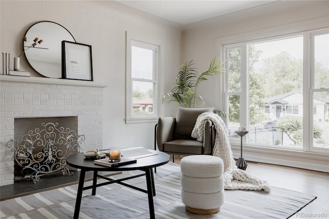 3055 Clermont St, Denver, CO 80207 - living area with wood finished floors and a fireplace
