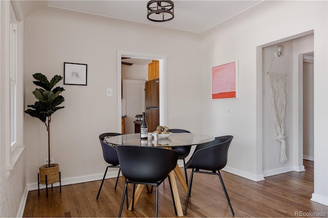 3055 Clermont St, Denver, CO 80207 - dining area with wood finished floors and baseboards
