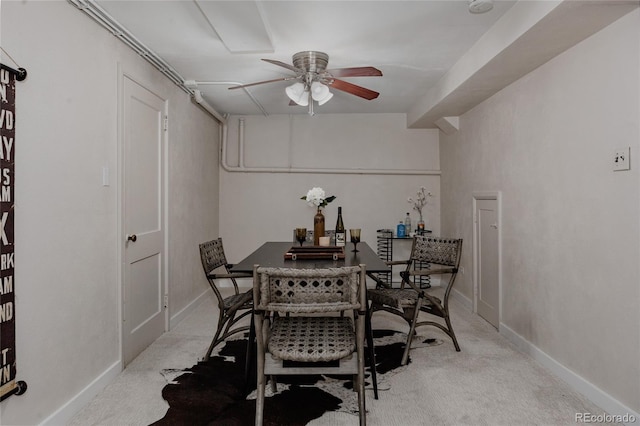3055 Clermont St, Denver, CO 80207 - dining space with a ceiling fan, light carpet, and baseboards