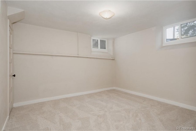 3055 Clermont St, Denver, CO 80207 - below grade area with light carpet and baseboards