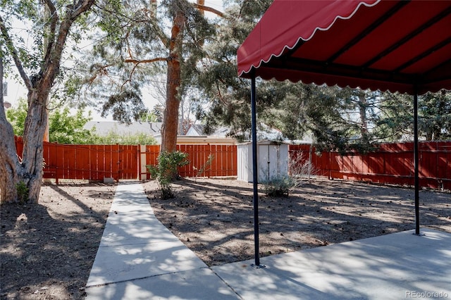 3055 Clermont St, Denver, CO 80207 - fenced backyard with a storage unit and an outdoor structure