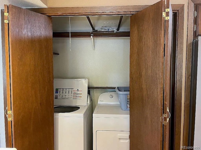 laundry room featuring washer and dryer