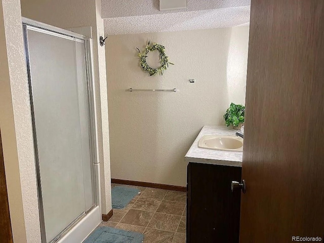 bathroom featuring vanity and walk in shower