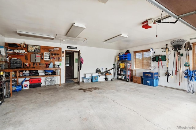 garage with a workshop area