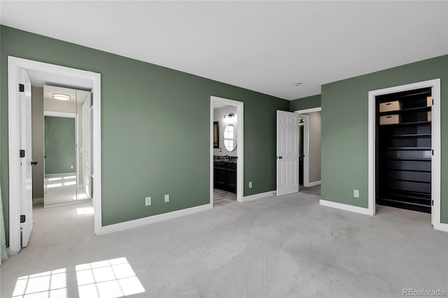 11565 Crow Hill Dr, Parker, CO 80134 - unfurnished bedroom featuring carpet, connected bathroom, and a spacious closet