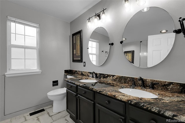 11565 Crow Hill Dr, Parker, CO 80134 - full bath with marble look tile flooring and double vanity