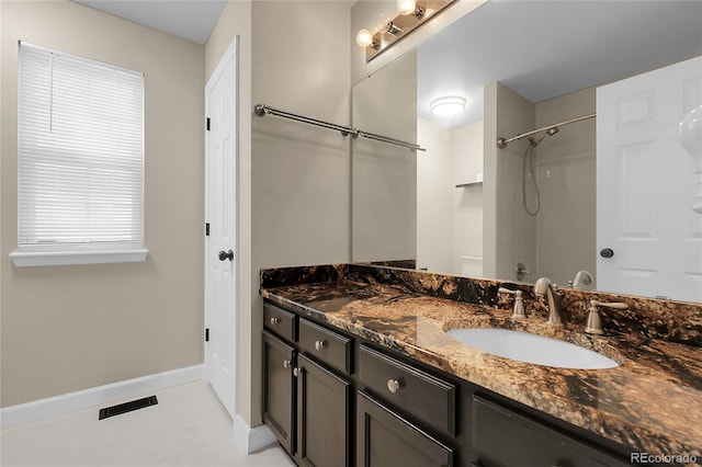 11565 Crow Hill Dr, Parker, CO 80134 - full bathroom featuring vanity, a shower, and tile patterned flooring