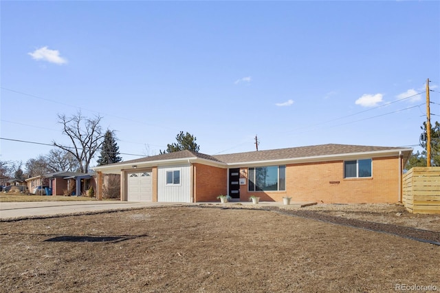 single story home featuring a garage